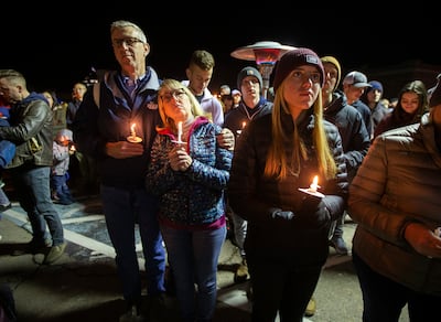 Gary Calder, Heidi Calder and Brooklynn Wolken join hundreds who came to pay respects to slain Provo police officer Joseph Shinners at the Provo Police Department on Wednesday, Jan. 9, 2019.