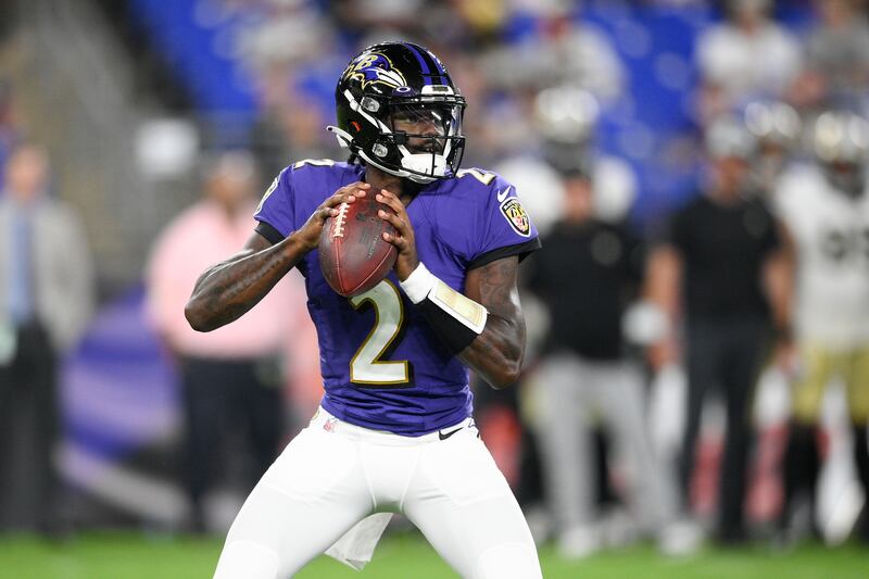 Baltimore Ravens quarterback Tyler Huntley looks to pass against the New Orleans Saints.