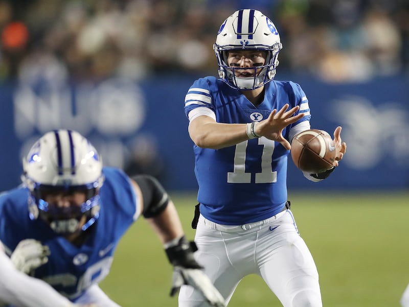 Brigham Young Cougars quarterback Zach Wilson (11) takes the snap in Provo on Saturday, Nov. 17, 2018. Wilson has started in 16 games for the Cougars heading into his junior season and is projected by the Deseret News to win the starting job in 2020.