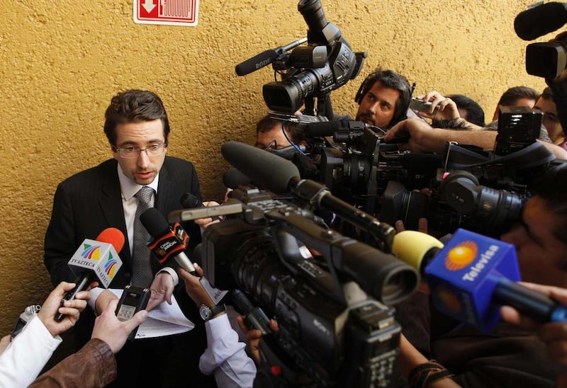 Florian Blazy, second counselor of the Embassy of France in Mexico, speaks with journalists outside a courtroom in Mexico City, Thursday, Feb. 10, 2010. An appeals court on Thursday upheld the conviction and the 60-year-sentence of Florence Cassez, a Fren