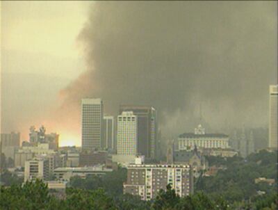 A power substation explodes as a tornado rips through downtown Salt Lake City on Wednesday, Aug. 11, 1999.