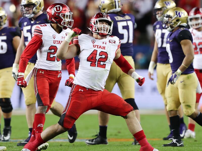 Utah Utes defensive end Mika Tafua (42) celebrates a sack as Utah and Washington play in the Pac-12 Championship game at Levi's Stadium in Santa Clara on Friday, Nov. 30, 2018.