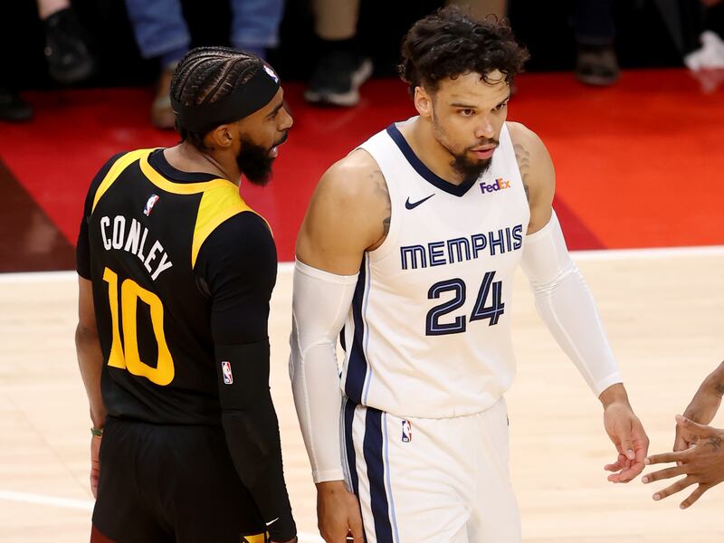 Jazz guard Mike Conley has a few words for Memphis Grizzlies’ Dillon Brooks during a playoff game in Salt Lake City, Utah.