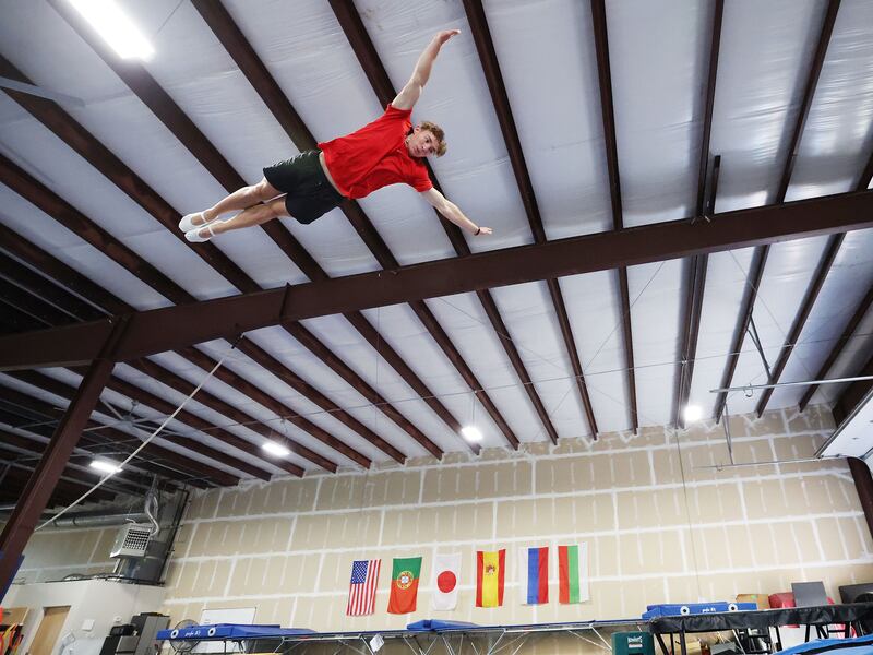 Simon Smith, of Springville, a gymnast representing Team USA for the upcoming Trampoline World Cup, works out in Orem on Thursday, June 29, 2023.