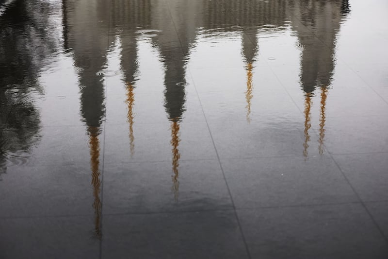 Rain falls as Latter-day Saint leaders conduct tours for members of the media at the Washington D.C. Temple in Kensington, Maryland.