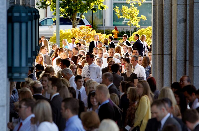 Conference goers file into the Conference Center in Salt Lake City.