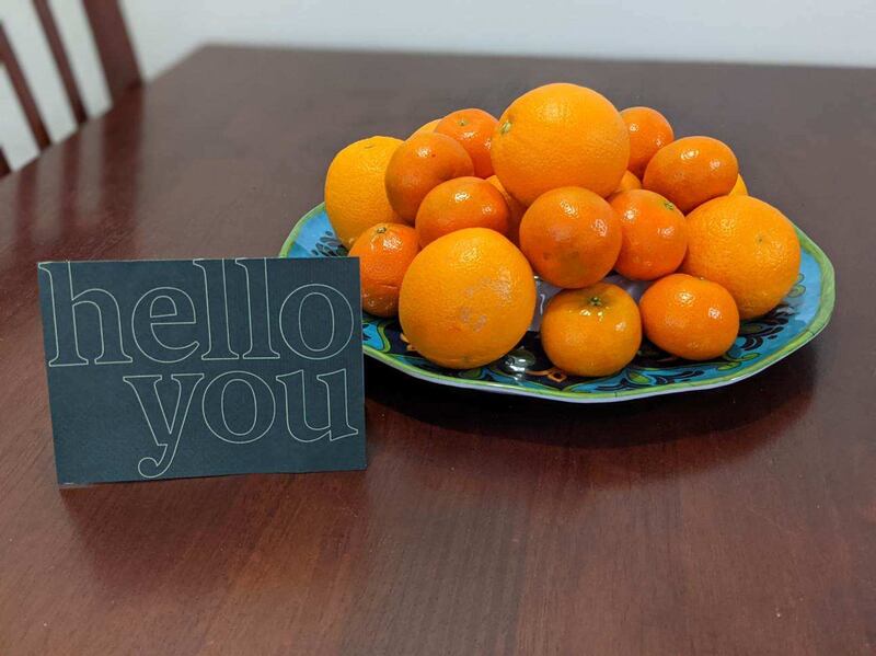 A plate of oranges with a welcome sign await a new refugee family in an apartment furnished by a group of Latter-day Saint volunteers in Houston.