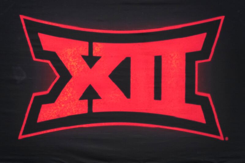 A sign at the NCAA college football Big 12 media days in Arlington, Texas, Thursday, July 14, 2022.