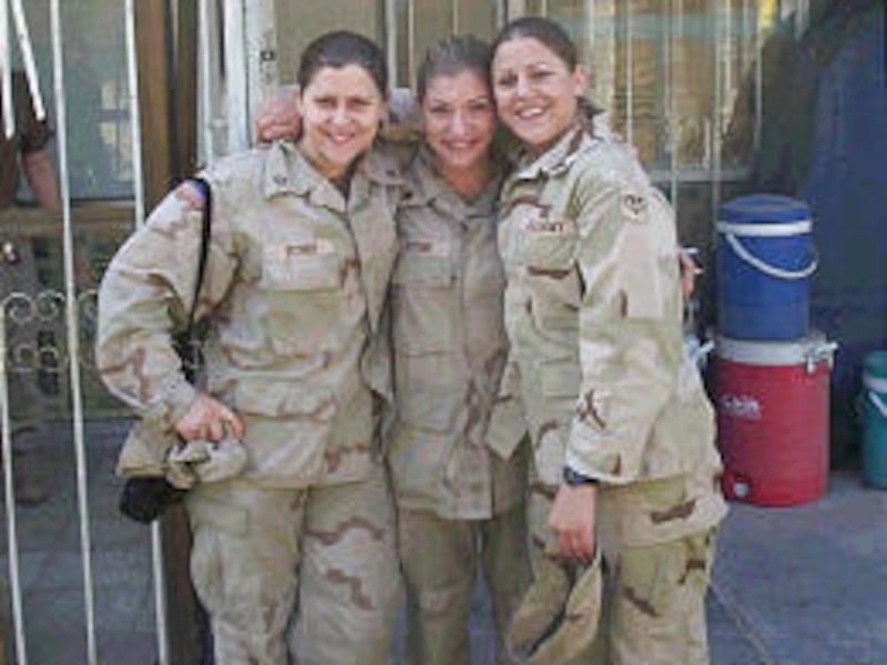 Michelle, left, Rachel and Charity Witmer pose in Iraq in an undated photo. Michelle was killed April 9 in Baghdad.