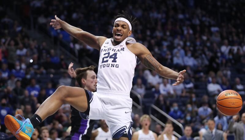 Brigham Young Cougars forward Seneca Knight (24) dunks on the Portland Pilots in Provo on Saturday, Jan. 22, 2022.