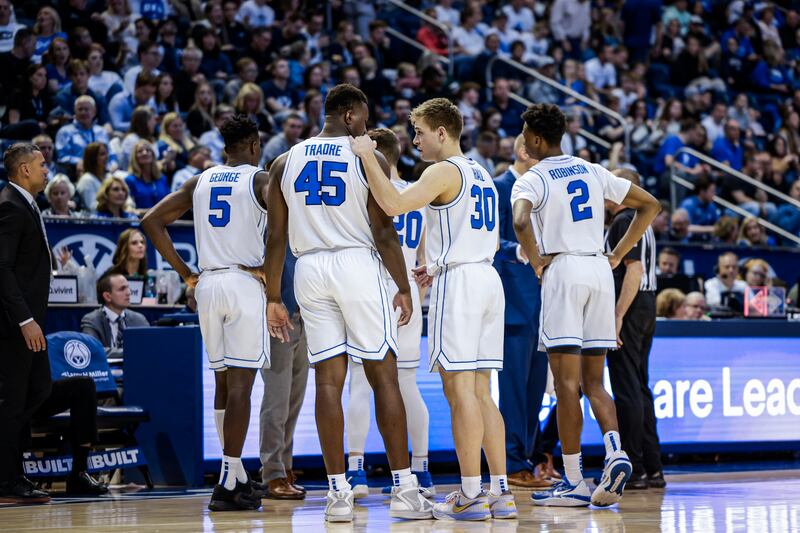 BYU Cougars basketball players huddle during their 91-81 win over the Pepperdine Waves on Saturday, January 14, 2023 at the Marriott Center in Provo, Utah.