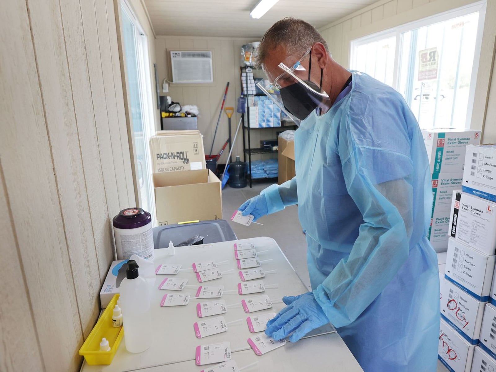 COVID-19 tests are processed at the Mount Olympus Senior Center parking lot in Millcreek on Tuesday, Oct. 5, 2021.