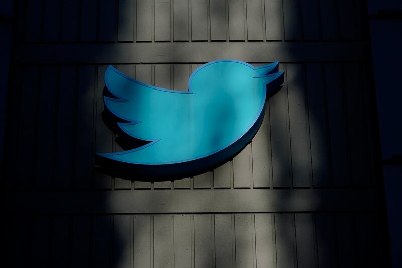 A sign at Twitter headquarters is shown in San Francisco, Friday, Nov. 18, 2022.