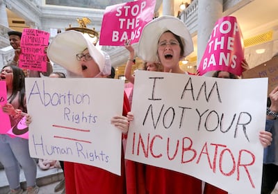 Vivian Malan and Bliss Vandeventer cheer during a rally against abortion bans as part of Stop the Bans Day of Action at the Capitol in Salt Lake City on Tuesday, May 21, 2019.