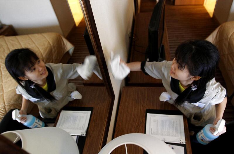 Tirtha Rai, a refugee from Bhutan, cleans rooms at the American Inn in Twin Falls, Idaho.