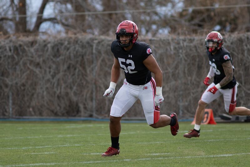 Utah freshman linebacker Mason Tufaga runs through drills during spring camp at the University of Utah in Salt Lake City. 