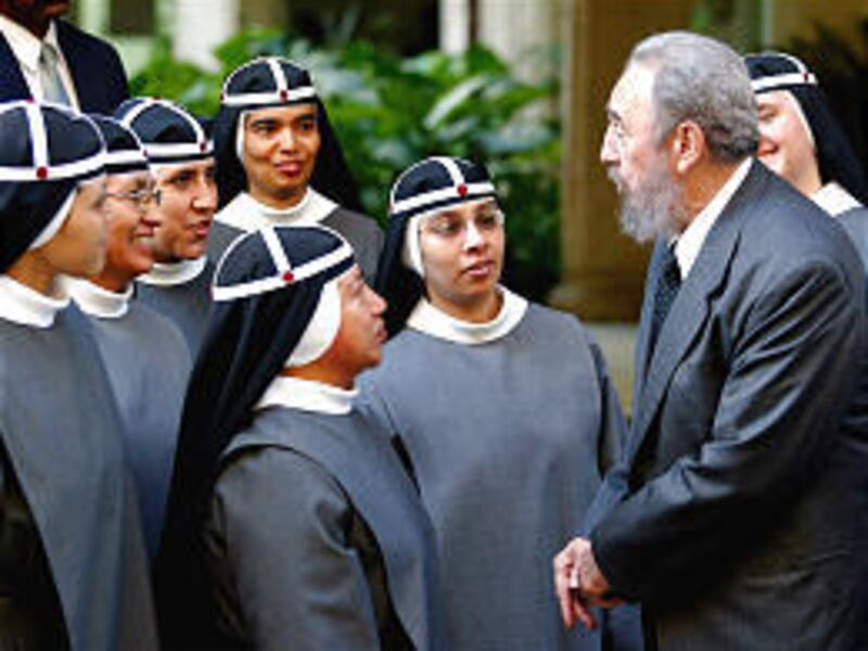 Cuban President Fidel Castro attends the consecration ceremony for the new Orthodox Christian cathedral.