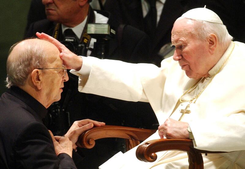 In this Nov. 30, 2004 file photo, Pope John Paul II gives his blessing to father Marcial Maciel, founder of Christ''s Legionaries, during a special audience the pontiff granted to about four thousand participants of the Regnum Christi movement, at the Vat