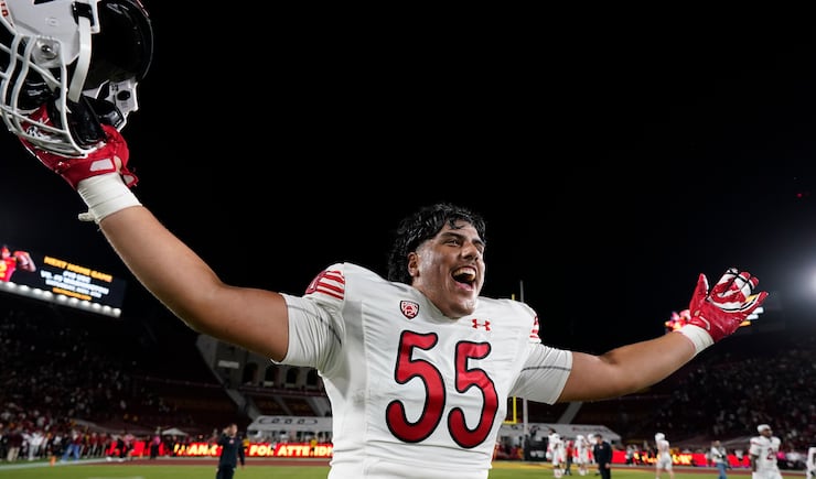 Utah offensive lineman Spencer Fano celebrates after the team's win against Southern California, Saturday, Oct. 21, 2023, in Los Angeles.