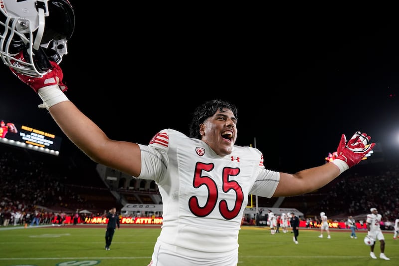Utah offensive lineman Spencer Fano celebrates after the team's win against Southern California, Saturday, Oct. 21, 2023, in Los Angeles.