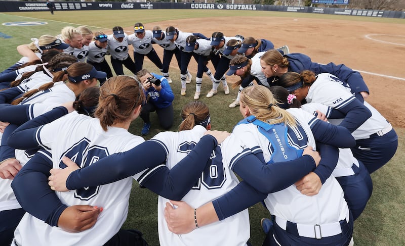 BYU players huddle prior to a game with Boise State in Provo on Tuesday, March 21, 2023.