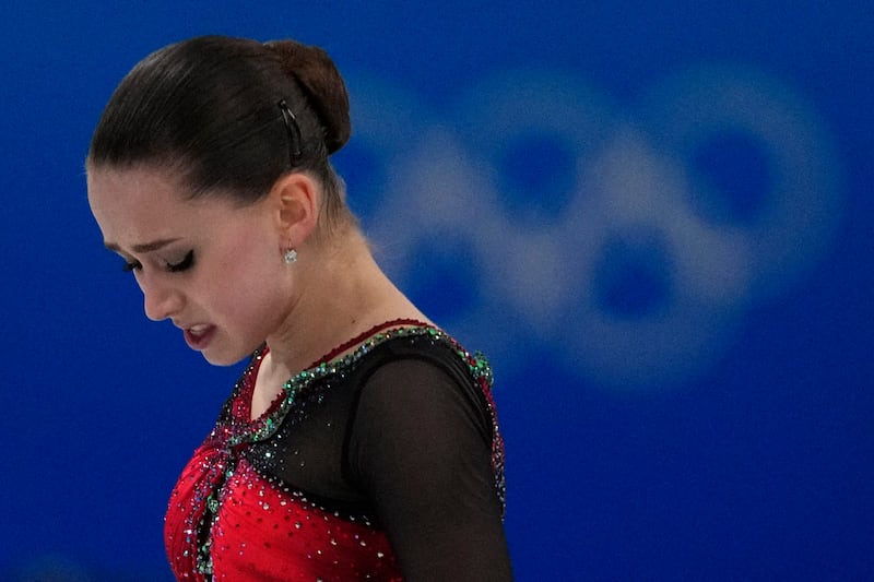 Kamila Valieva, of the Russian Olympic Committee, reacts after the women’s free skate program at the 2022 Winter Olympics.