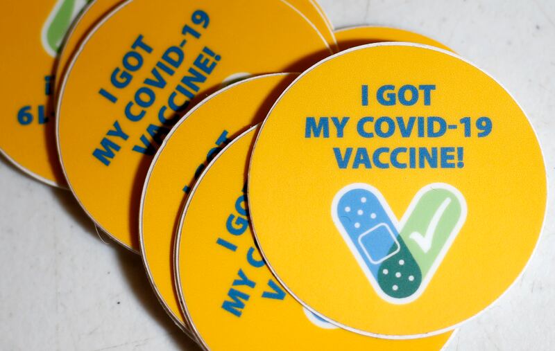 Stickers are available for people who get COVID-19 vaccinations at the South Davis Senior Activity Center in Bountiful on Wednesday, Aug. 25, 2021.
