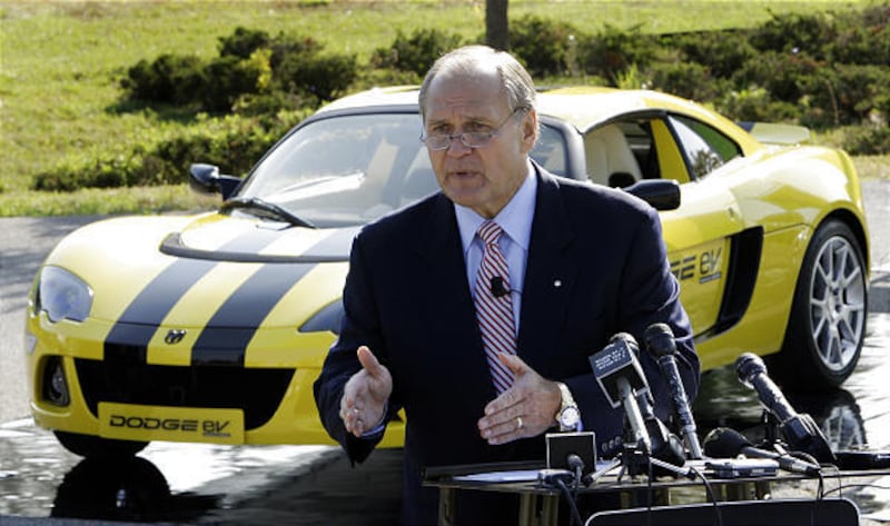 Chrysler CEO Bob Nardelli stands in front of the prototype of a new electric Dodge sports car he introduced Tuesday.