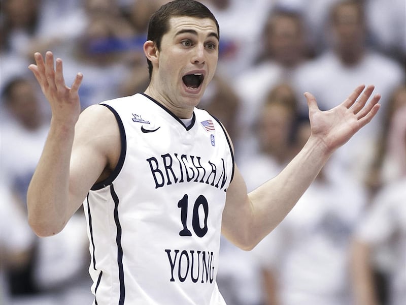 BYU's Matt Carlino yells back to the bench during play as BYU and St. Mary's Wednesday, Jan. 16, 2013 in the Marriott Center at BYU. St. Mary's won 70-69 on a last second shot by Matthew Dellavedova.