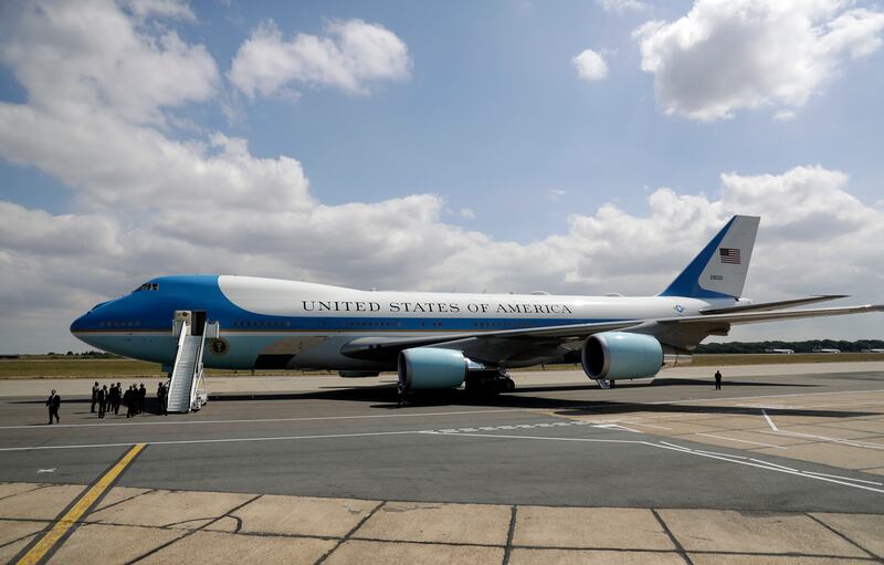Air Force One, carrying U.S. President Donald Trump and First Lady Melania Trump stands on the tarmac after it landed at London Stansted Airport in Stansted, England, Thursday, July 12, 2018. Trump is making his first trip to Britain as president after a