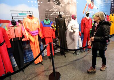 Patrice Young looks at vintage ski clothing from the Barbara Alley Collection at the Alf Engen Ski Museum at the Utah Olympic Park in Park City on Tuesday, Nov. 27, 2018.