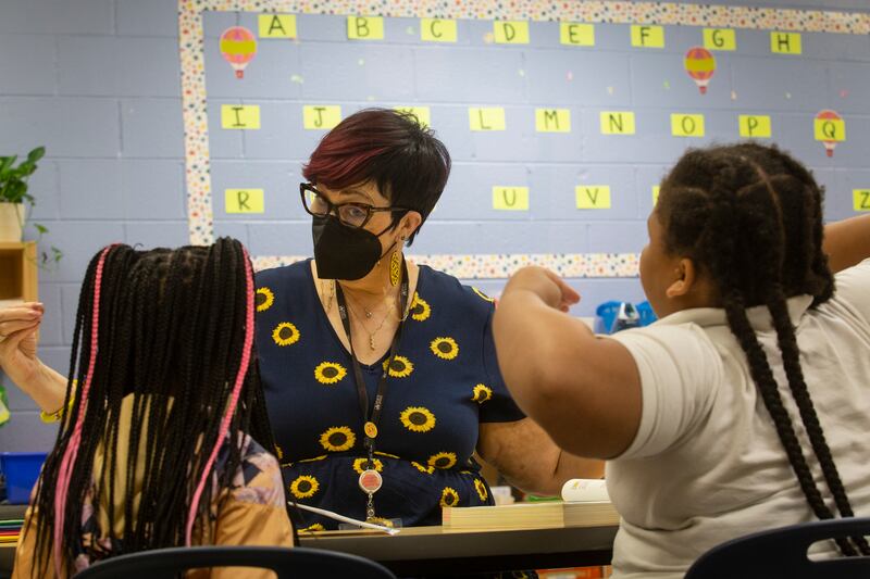 Third grade students take part in a small group reading session at Beecher Hills Elementary School on Friday, Aug. 19, 2022, in Atlanta.