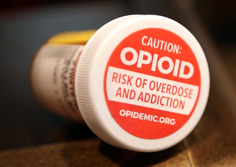 Stickers encourage Utahns to talk to their pharmacists about the dangers of prescription opioids.