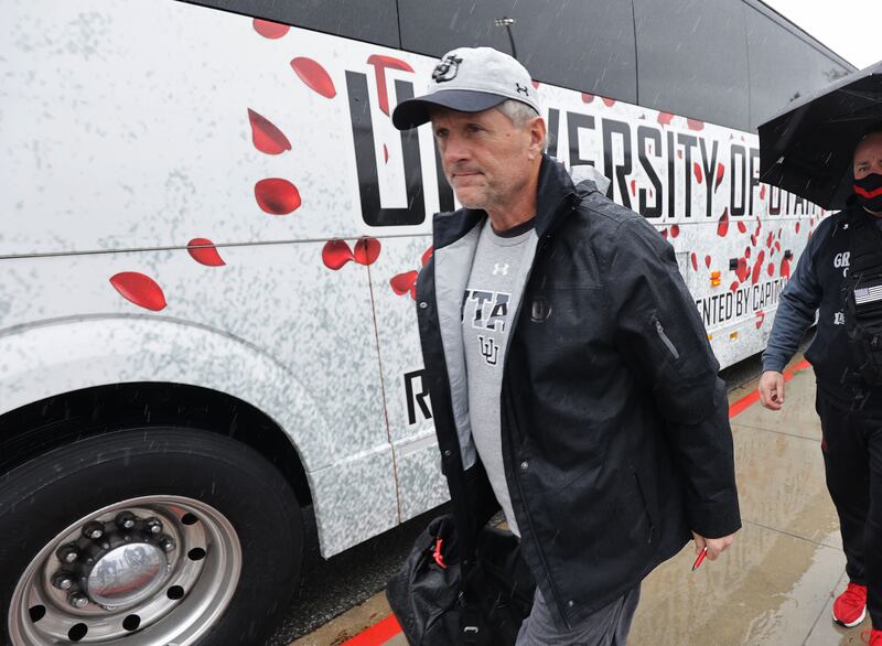 Utah coach Kyle Whittingham walks to practice for the Rose Bowl at a field at Harbor College in Wilmington, Calif.