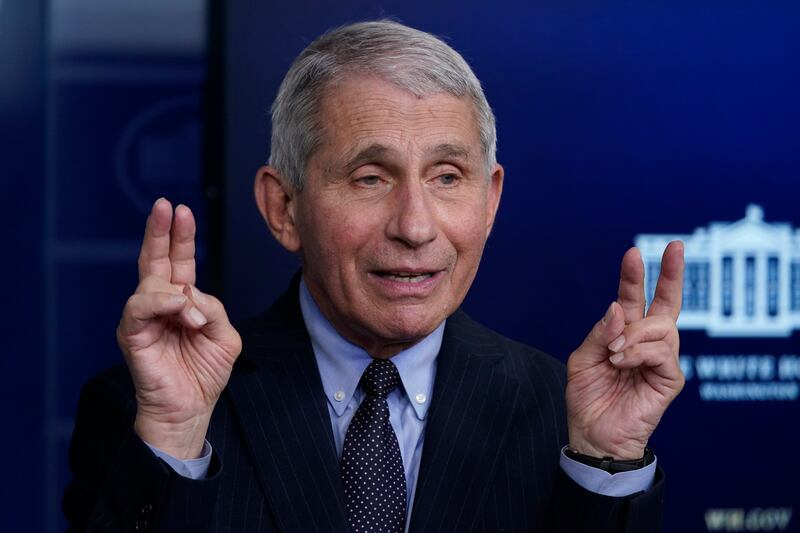 Dr. Anthony Fauci, director of the National Institute of Allergy and Infectious Diseases, speaks with reporters in the James Brady Press Briefing Room at the White House, Thursday, Jan. 21, 2021, in Washington.