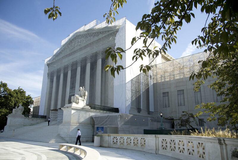 In this Oct. 1, 2012, file photo shows the U.S. Supreme Court in Washington. The high court can choose from a wide array of outcomes in ruling on California's Proposition 8 ban on same-sex marriage and the federal Defense of Marriage Act (DOMA), which def