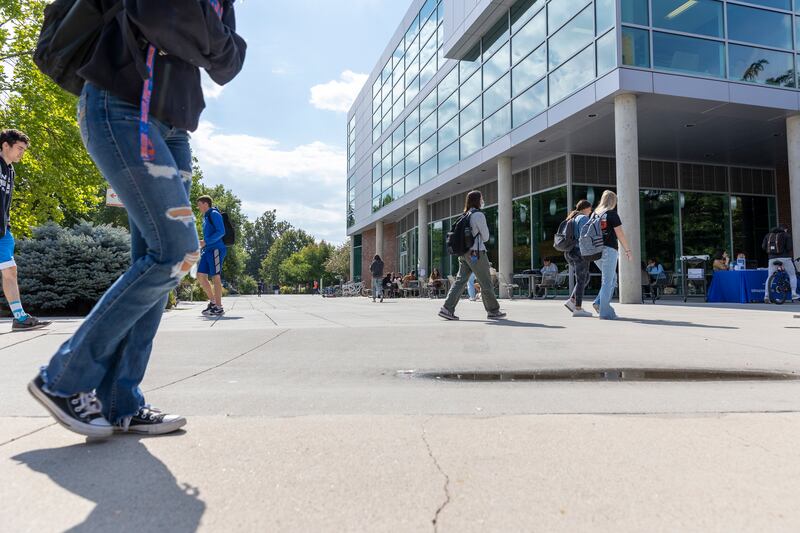 Students walk at Boise State University in Boise.