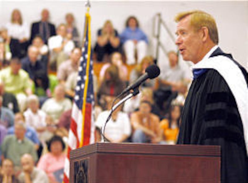 Nolan D. Archibald gives the commencement speech at Snow, where he talked about goal-setting.