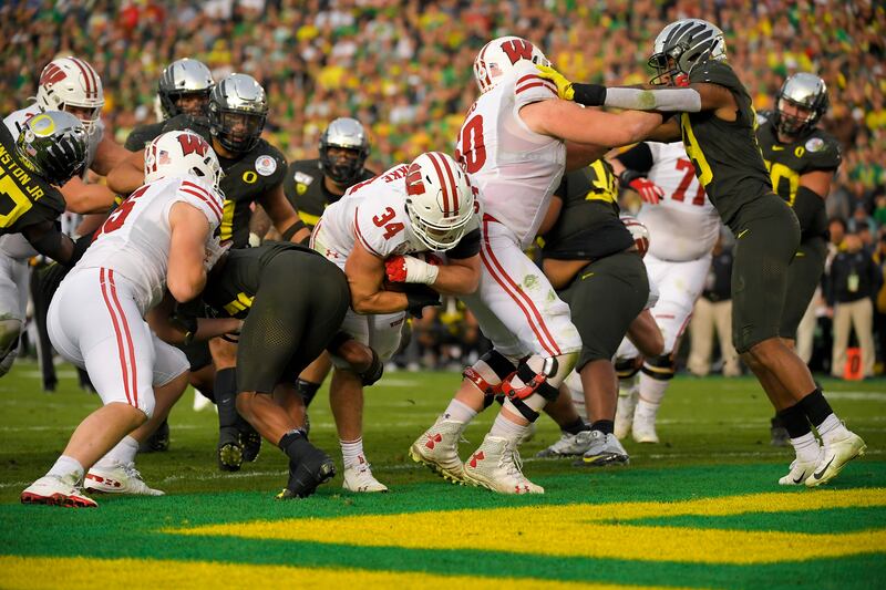 Wisconsin fullback Mason Stokke scores against Oregon during the Rose Bowl college football game Wednesday, Jan. 1, 2020.
