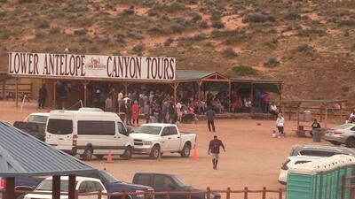 Vehicles fill a parking lot at Lower Antelope Canyon at Lake Powell. Tourism has become a major source of revenue for the Navajo Nation as the industry in the Page area has evolved into a year-round business.