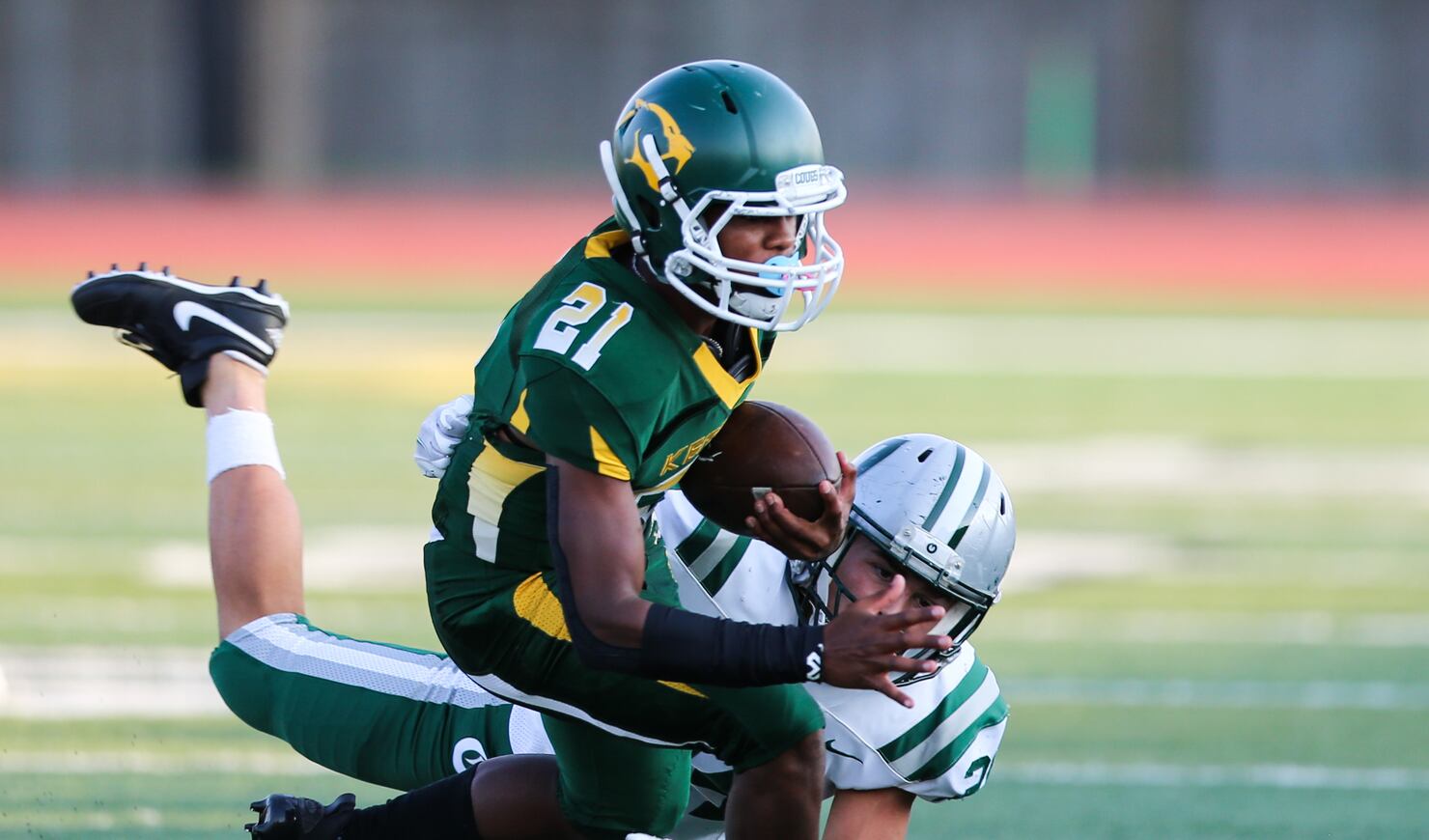 High school football Kearns holds tough in slugfest 147 win over