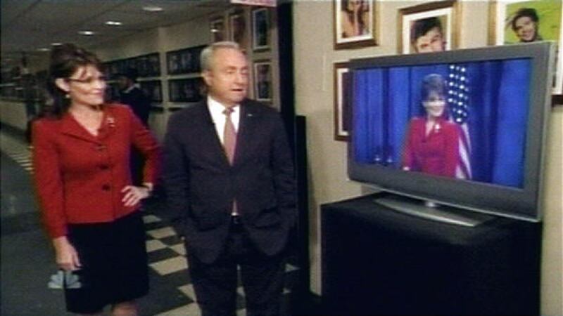 The real Sarah Palin arrives on the "Saturday Night Live" set with executive producer Lorne Michaels.