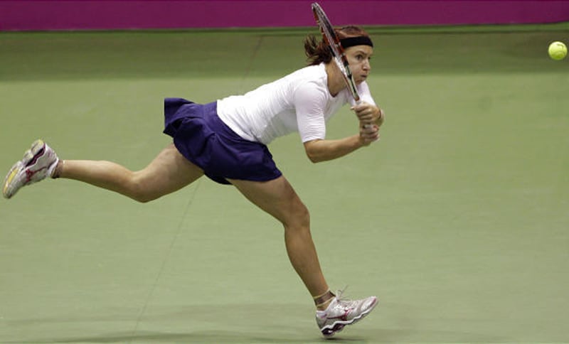 United States' Bethanie Mattek-Sands returns a ball to Czech Republic's Lucie Safarova during their semi-final Fed Cup tennis match in Brno, Czech Republic, Sunday.