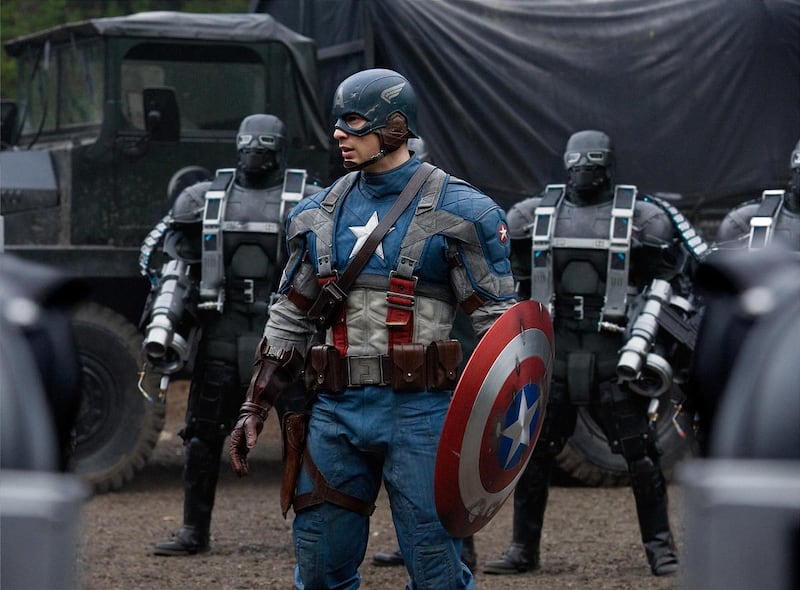 Captain America (Chris Evans) is surrounded by HYDRA Soldiers in “Captain America.”
