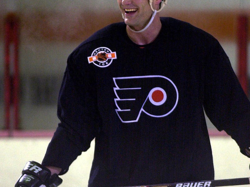 FILE - In this May 23, 2000, file photo, Philadelphia Flyers' Eric Lindros smiles during practice, in Voorhees, N.J. Eric Lindros was an MVP, a captain and led the Philadelphia Flyers to the Stanley Cup finals. That was before his relationship with the f