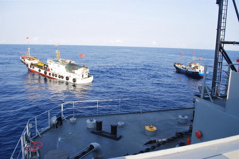 Two Chinese trawlers stop directly in front of the military Sealift Command ocean surveillance ship USNS Impeccable in the South China Sea.