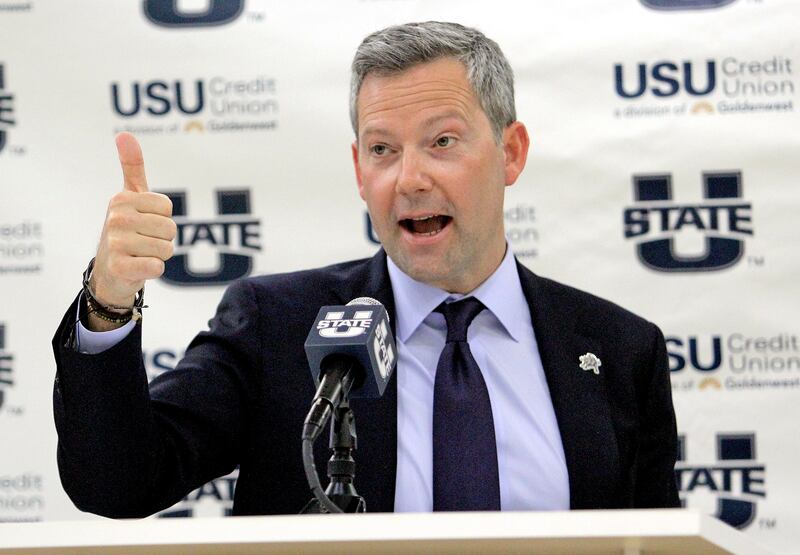 New Utah State men’s basketball coach Ryan Odom ends his introductory press conference with a “thumbs up.”