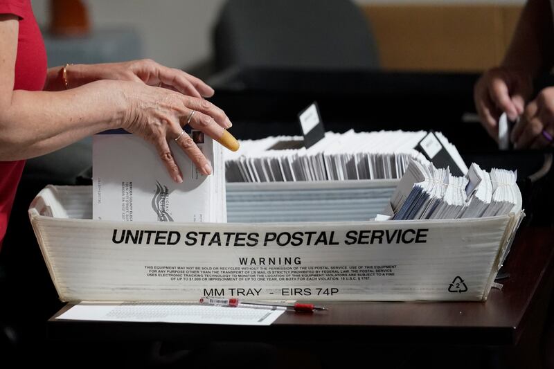 Election workers continue the process of counting ballots for the Pennsylvania primary election.