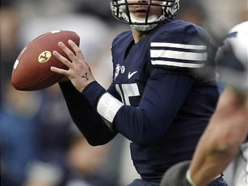 Max Hall looks to pass as BYU and Air Force play at Lavell Edwards Stadium. Saturday, Nov. 21, 2009. Photo by Scott G Winterton Deseret News.
