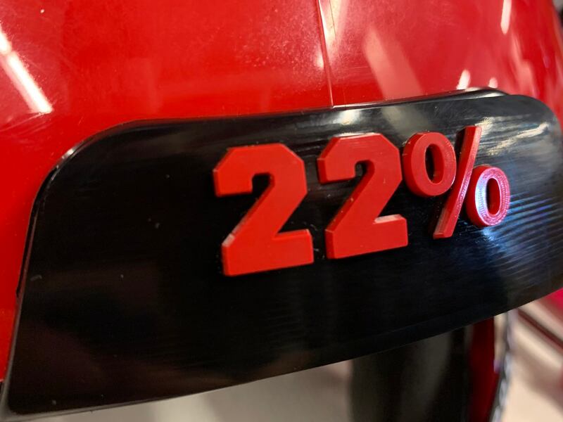 “22%” bumper on a practice helmet